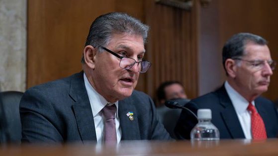 Sen. Joe Manchin, left, chair of the Senate Energy and Natural Resources Committee, is joined by Sen. John Barrasso as the panel hears from Interior Secretary Deb Haaland on President Joe Biden's budget request for 2024 at a hearing on May 2.