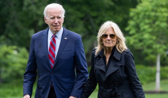 President Joe Biden and First Lady Jill Biden walk on the South Lawn of the White House in Washington, D.C., on Tuesday.