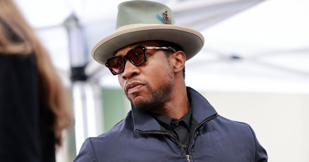 Jonathan Majors attends Hollywood Walk Of Fame Star Ceremony honoring Michael B. Jordan in Hollywood, California, on March 1.