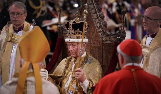 King Charles III is crowned during his coronation ceremony in Westminster Abbey on Saturday in London.