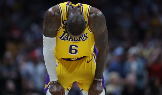 LeBron James of the Los Angeles Lakers reacts after losing to the Denver Nuggets in Game 2 of the Western Conference Finals at Ball Arena on Thursday in Denver.