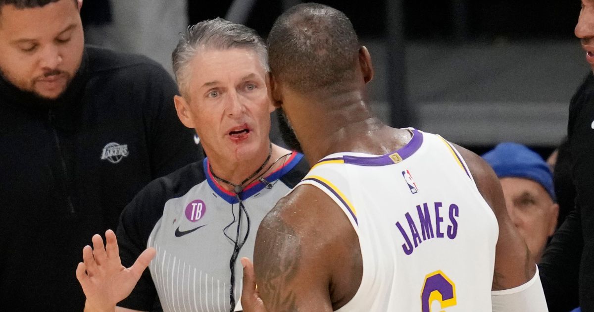 During the first half of Game 3 of the NBA basketball Western Conference Final series on Saturday, LeBron James, right, injured a referee.