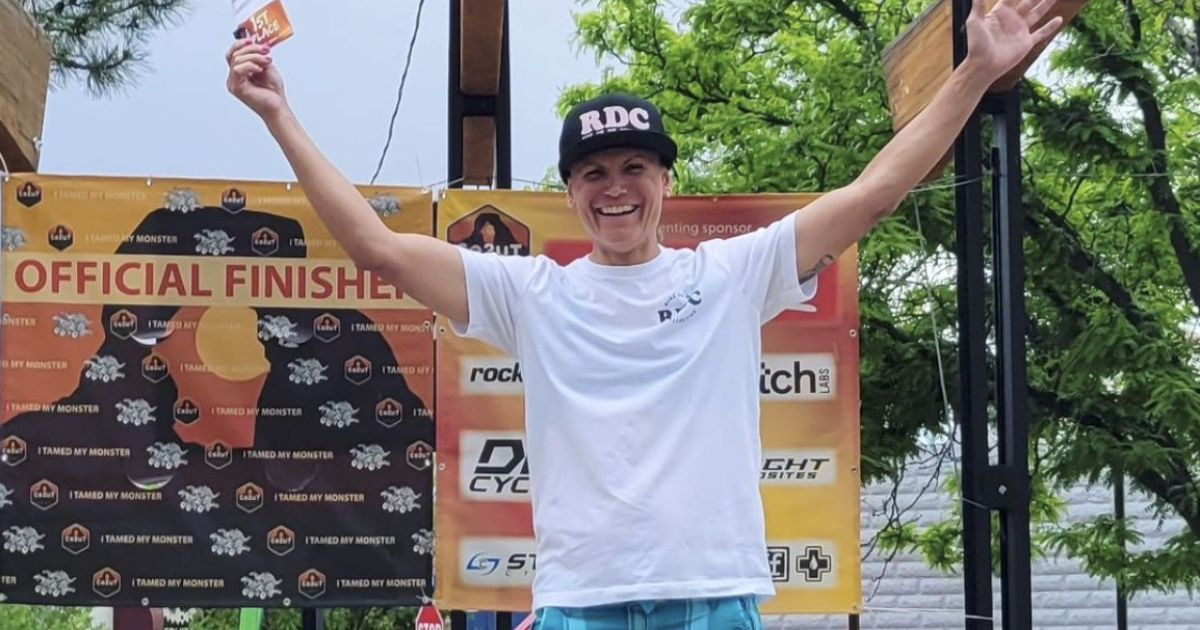 Male cyclist wins women’s race, check out his surroundings on the podium.