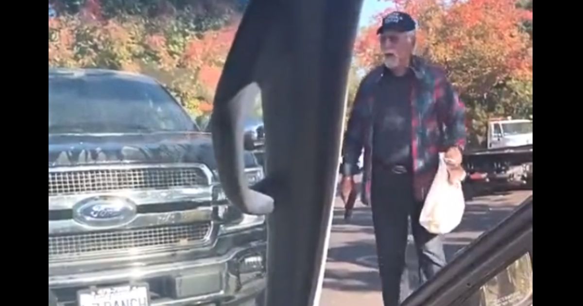 Punk pours gasoline on truck, old man pulls out pistol.