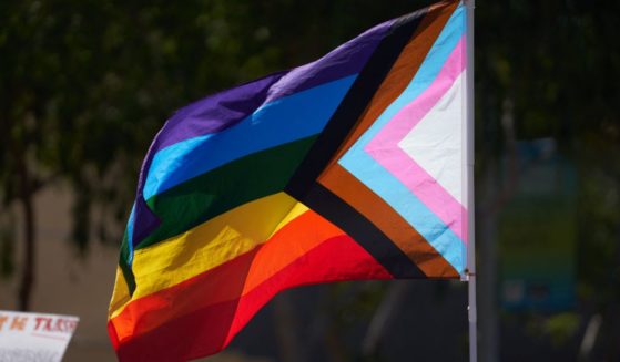 A progress pride flag is pictured during the Los Angeles "Drag March LA: The March on Santa Monica Boulevard" in West Hollywood, California, on April 9.