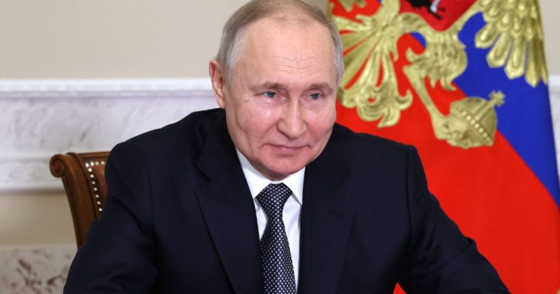 Russian President Vladimir Putin attends a ceremony resuming trams operation in the Azov Sea port city of Mariupol via video conference call in Saint Petersburg on Tuesday.