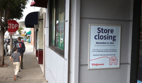A sign announces the planned closure of a Walgreens drug store in 2021 in San Francisco. Walgreens closed five of its San Francisco stores due to organized retail shoplifting that has plagued its stores in the city. Now, other stores are following suit and fleeing the city.