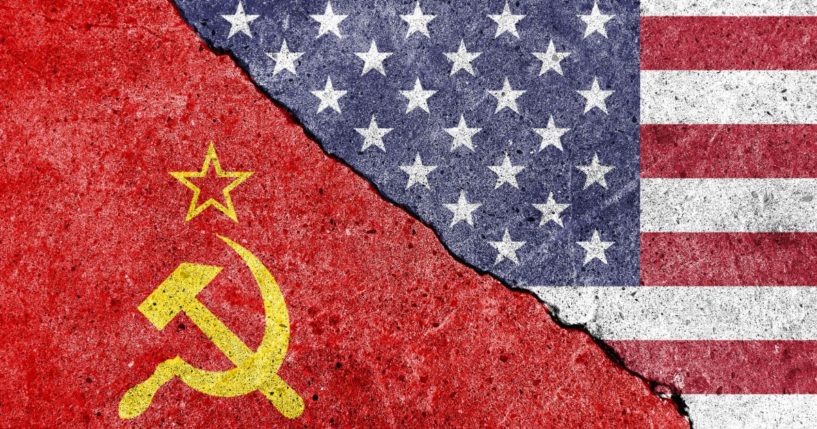 The Soviet and American flags are seen in the above stock image.