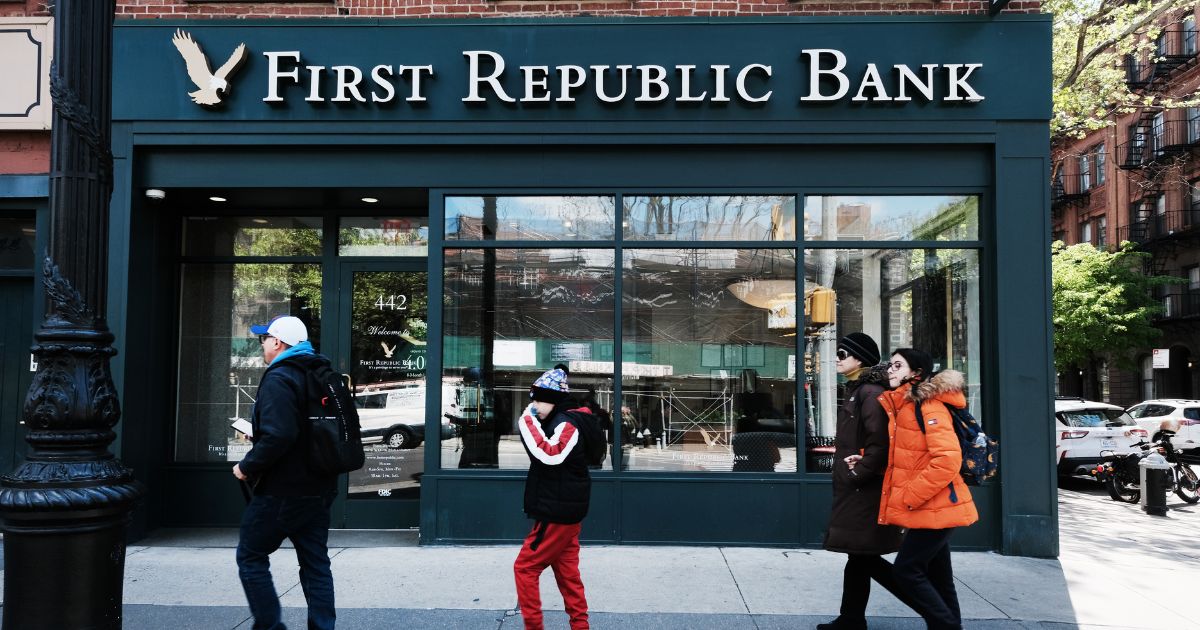 A person walks past a First Republic bank branch in Manhattan on April 24 in New York City.