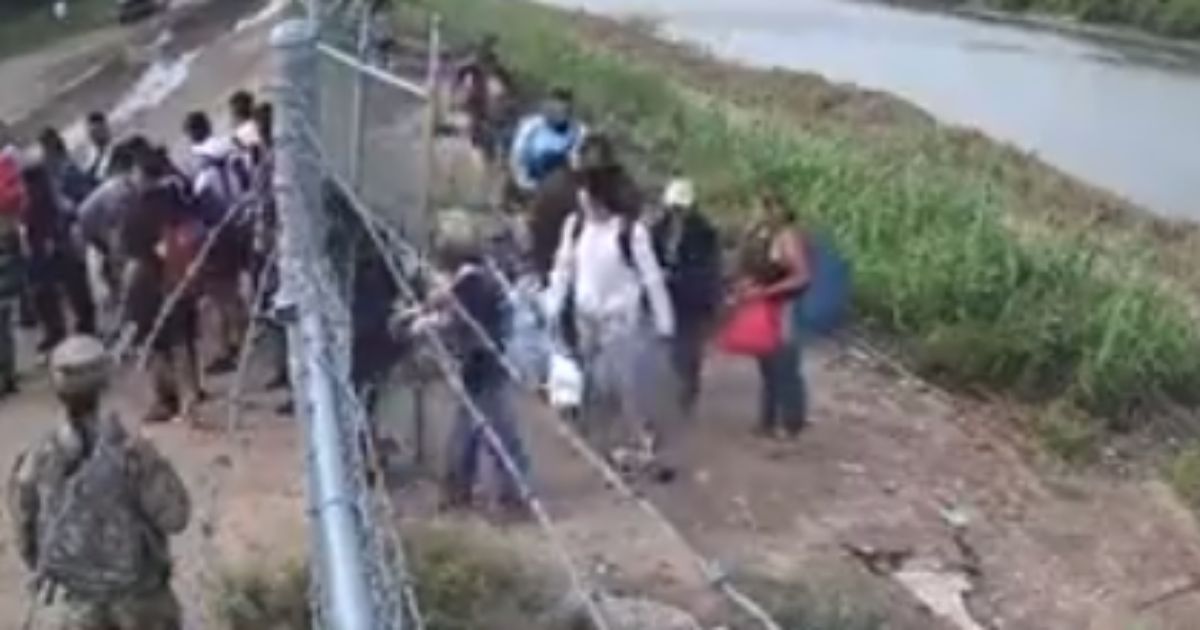 US soldier allows illegal immigrants onto private property in disturbing video.