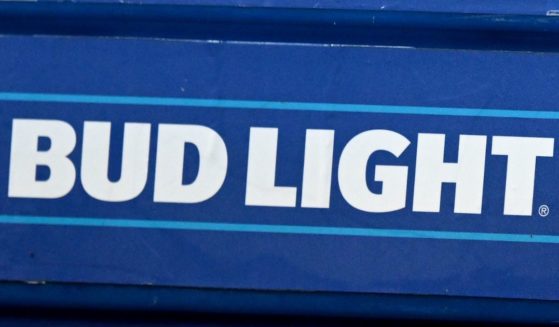 A vendor holds a container carrying Bud Light during the game between the Washington Nationals and the San Diego Padres at Nationals Park in Washington, D.C., on May 23.