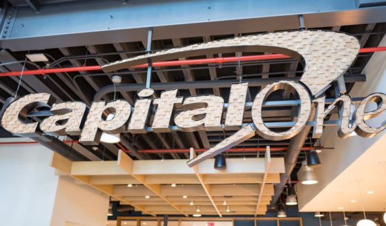 A metal sign for the financial services company Capital One, in downtown Walnut Creek, California, Nov. 17, 2017.