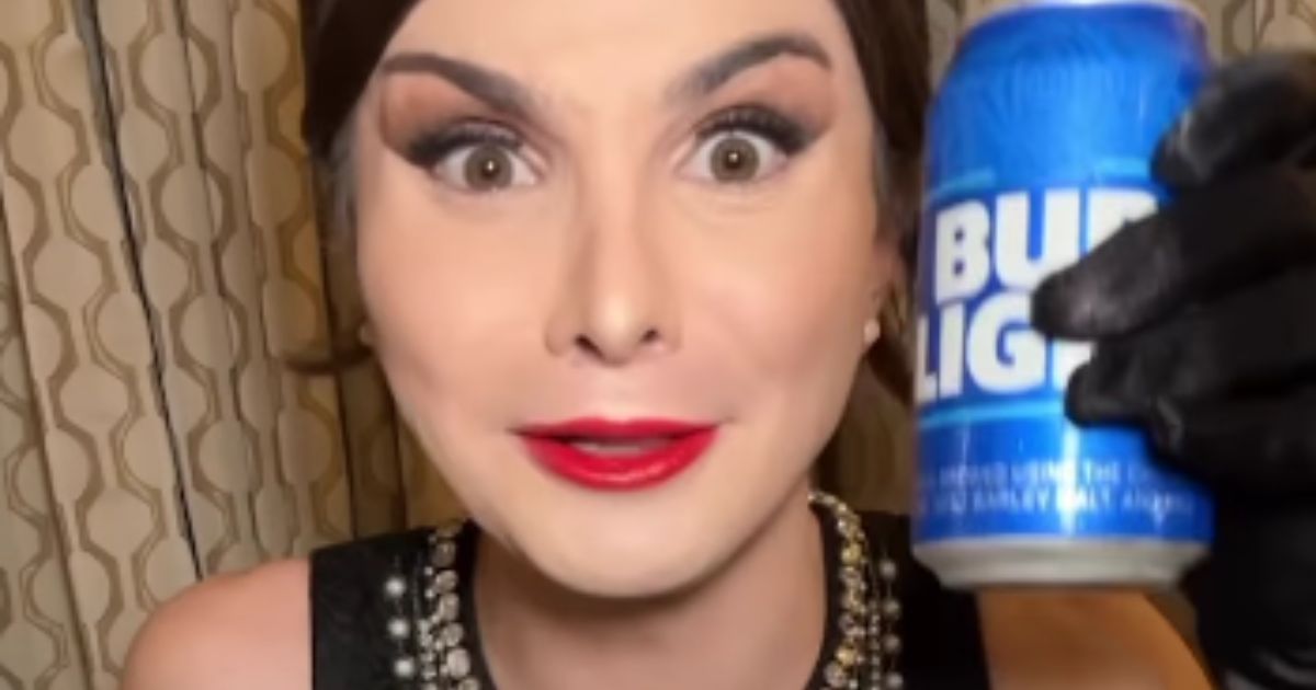 Transgender influencer Dylan Mulvaney is seen with a Bud Light can.