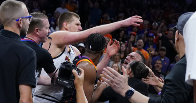 Nikola Jokic in an altercation in the stands