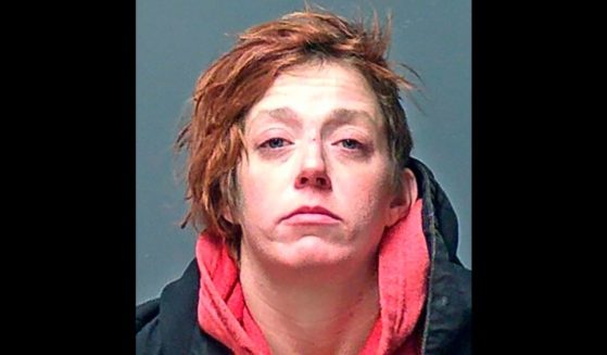 This booking photo provided by the Manchester Police Department shows Alexandra Eckersley, who faces criminal charges after police say she initially misled officers about the location of a newborn after giving birth to the child in the woods.
