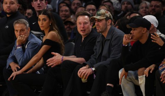 Business magnate and investor Elon Musk (center) is seen during game six of the Western Conference Semifinal Playoffs between the Los Angeles Lakers and the Golden State Warriors at Crypto.com Arena on May 12, 2023 in Los Angeles.