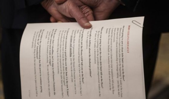 Notes photographed in the hand of Senate Majority Leader Chuck Schumer on Tuesday indicated Sen. Dianne Feinstein might return to Congress as soon as next week.