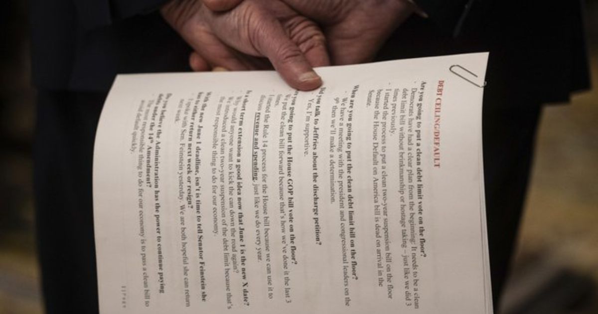 Notes photographed in the hand of Senate Majority Leader Chuck Schumer on Tuesday indicated Sen. Dianne Feinstein might return to Congress as soon as next week.