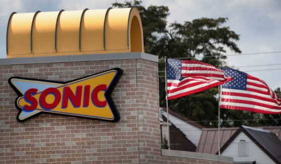 A sign hangs on the side of a Sonic restaurant on Sept. 25, 2018, in Cicero, Illinois.