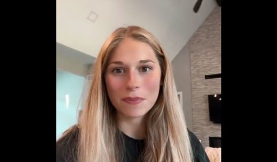A college student named Olivia posts a TikTok regarding an assignment she received a zero on.