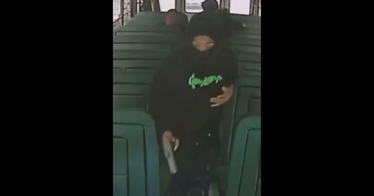 A teenager holds a gun on a Prince George's County, Maryland, school bus.