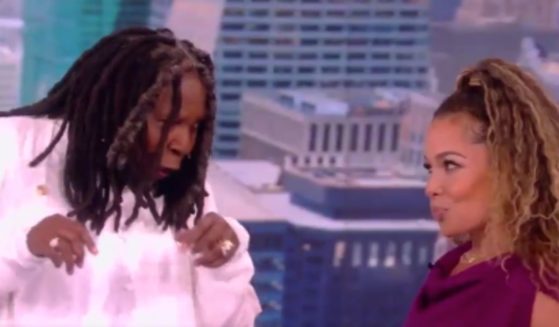 Whoopi Goldberg gives co-host Sunny Hostrin a lap dance on "The View."