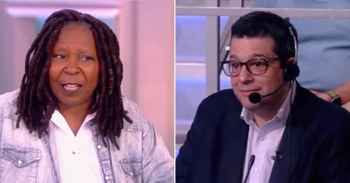 "The View" co-host Whoopi Goldberg, left, asks "The View" executive producer Brian Teta what the next topic is for the show.