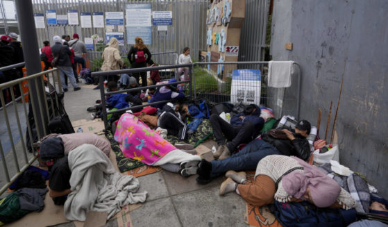 People waiting to apply for asylum