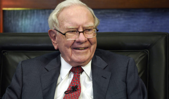 Berkshire Hathaway CEO Warren Buffett smiles during an interview in Omaha, Neb., in May 2018. After years of steady payments, Buffett has given billions in donations to the Bill & Melinda Gates Foundation and to other foundations connected to his family.