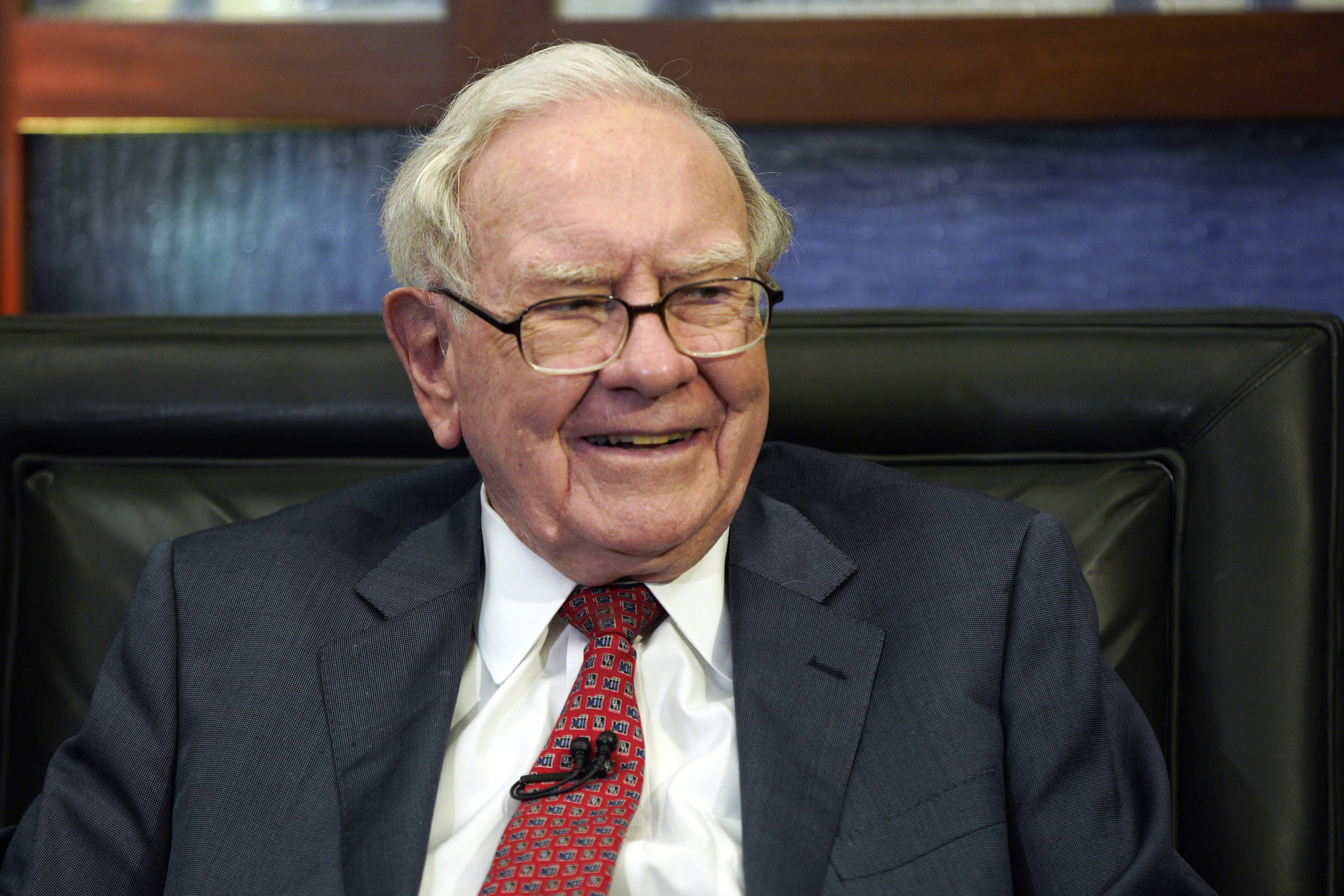 Berkshire Hathaway CEO Warren Buffett smiles during an interview in Omaha, Neb., in May 2018. After years of steady payments, Buffett has given billions in donations to the Bill & Melinda Gates Foundation and to other foundations connected to his family.