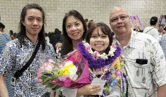 arek Agcaoili, left, with his mother Danielle, sister Jessika and father Maury Agcaoili pose in May at Jessika’s high school graduation in Hawaii. Danielle and Maury Agcaoili were among boaters who died last weekend during a fishing trip near Sitka, Alaska.