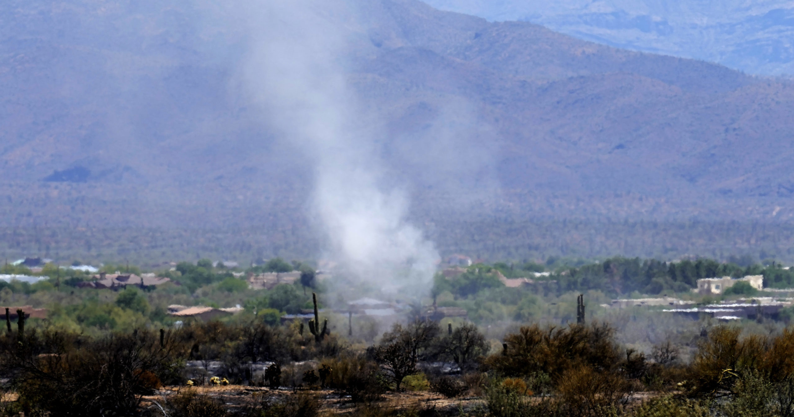 Smoke rises from the Diamond fire that caused mandatory evacuations Wednesday in Scottsdale, Arizona.