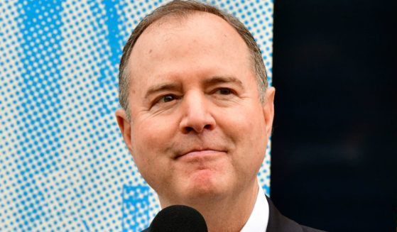 Rep. Adam Schiff peaks at the "Just Majority" Burbank Press Conference in Los Angeles, California, on May 26.