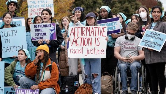 Activists demonstrate in Washington, D.C., on Oct. 31, 2022, as the Supreme Court hears oral arguments from two cases regarding affirmative action in college admissions.