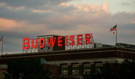 A Budweiser sign is seen atop the packaging plant in the Anheuser-Busch brewery complex in Saint Louis, Missouri, in a 2008 file photo.