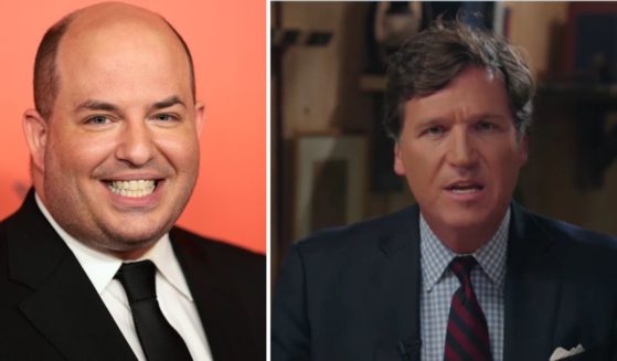 Brian Stelter, left, cast aspersions on the debut of Tucker Carlson's new show on Tuesday.