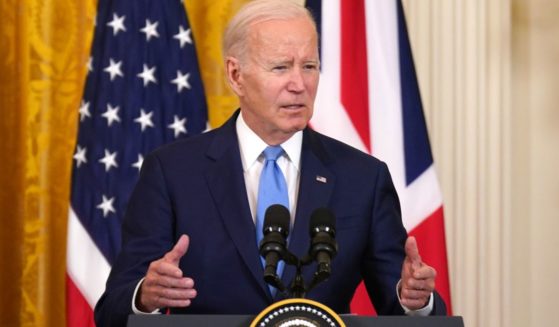 President Joe Biden laughed off a reporter's question about a report that he received a $5 million bribe when he was vice president.