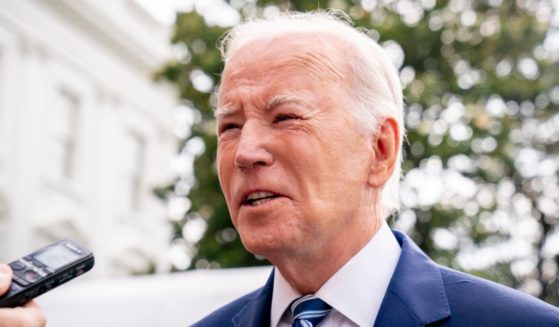 Marks are seen on President Joe Biden's face as he speaks with members of the media before boarding Marine One on the South Lawn of the White House in Washington on Wednesday.