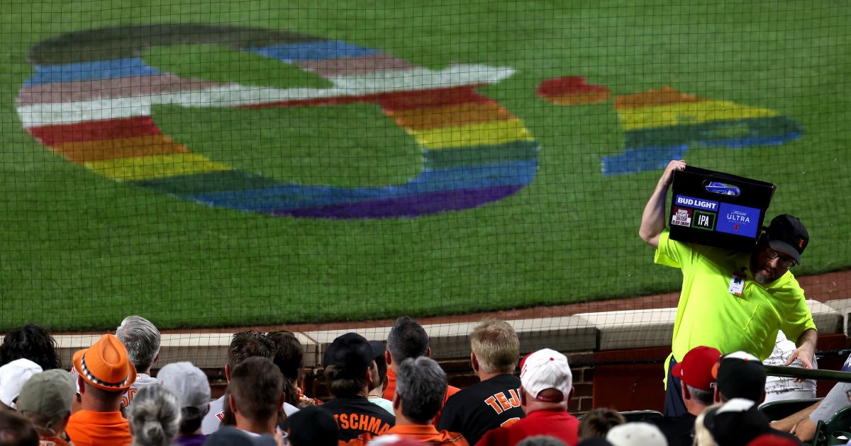 A vendor sells Bud Light and other brands during the Baltimore Orioles' LGBT "Pride Night" at Oriole Park at Camden Yards on Wednesday.