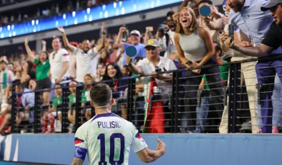 U.S. men's soccer player Christian Pulisic walks in front of fans, some who are jeering at him, after scoring a goal against Mexico in the first half of their game during the 2023 CONCACAF Nations League semifinals at Allegiant Stadium in Las Vegas on Thursday.