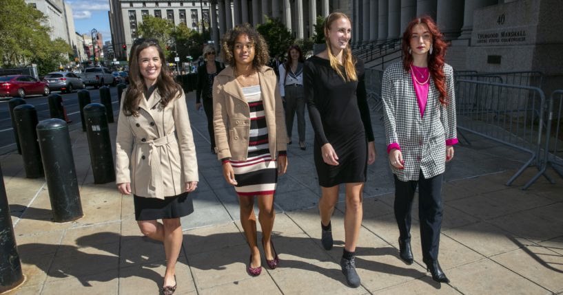 Attorney Christiana Kiefer and plaintiffs Alanna Smith, Chelsea Mitchell and Selina Soule walk outside federal court in lower Manhattan in New York City on Sept. 29, 2022.