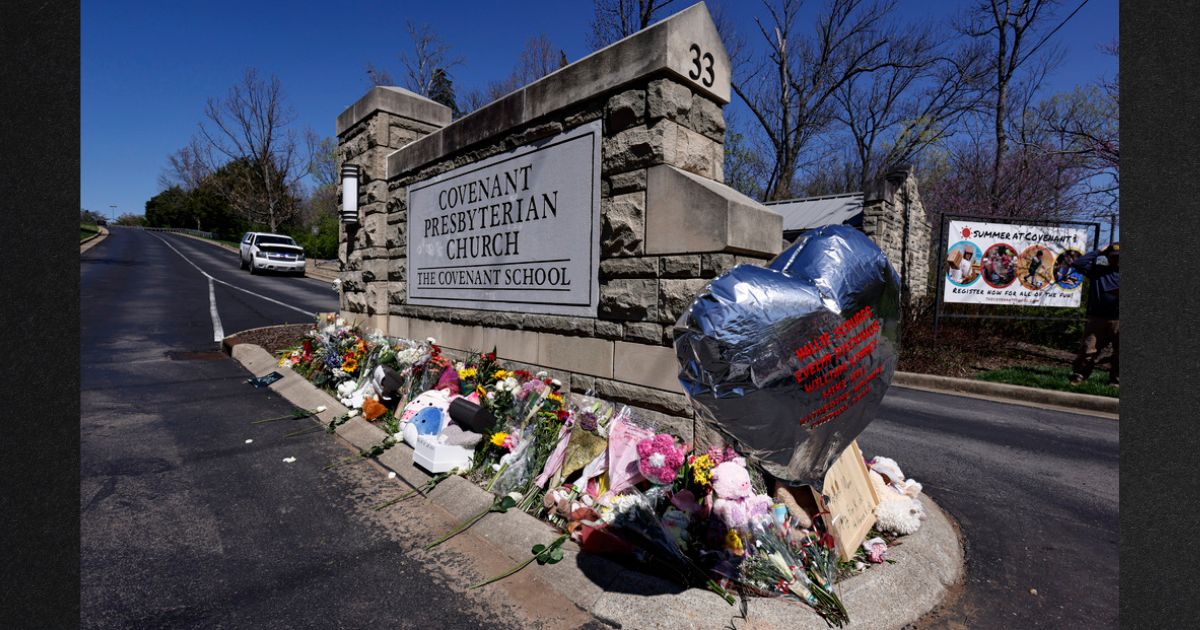 A balloon with names of six shooting victims is seen at a memorial at the entrance to The Covenant School in Nashville, Tennessee. A deranged attacker killed three children and three staff at the school in a March rampage.