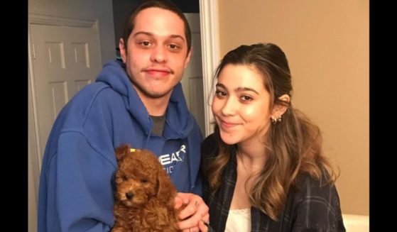 In an Instagram post from May 4, Pete Davidson and his sister, Casey, pose with his dog, Henry, who died in early May.