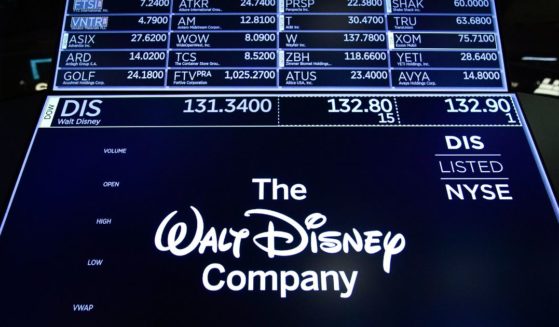 A logo for The Walt Disney Company displayed on a trading post