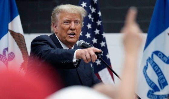 Former President Donald Trump visits with campaign volunteers at the Grimes Community Complex Park, Thursday, June 1, 2023, in Des Moines, Iowa. (Charlie Neibergall / Associated Press)