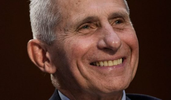 Dr. Anthony Fauci, then-director of the National Institute of Allergy and Infectious Diseases, smiles during a Senate Committee hearing on Capitol Hill in Washington on Sept. 14, 2022.