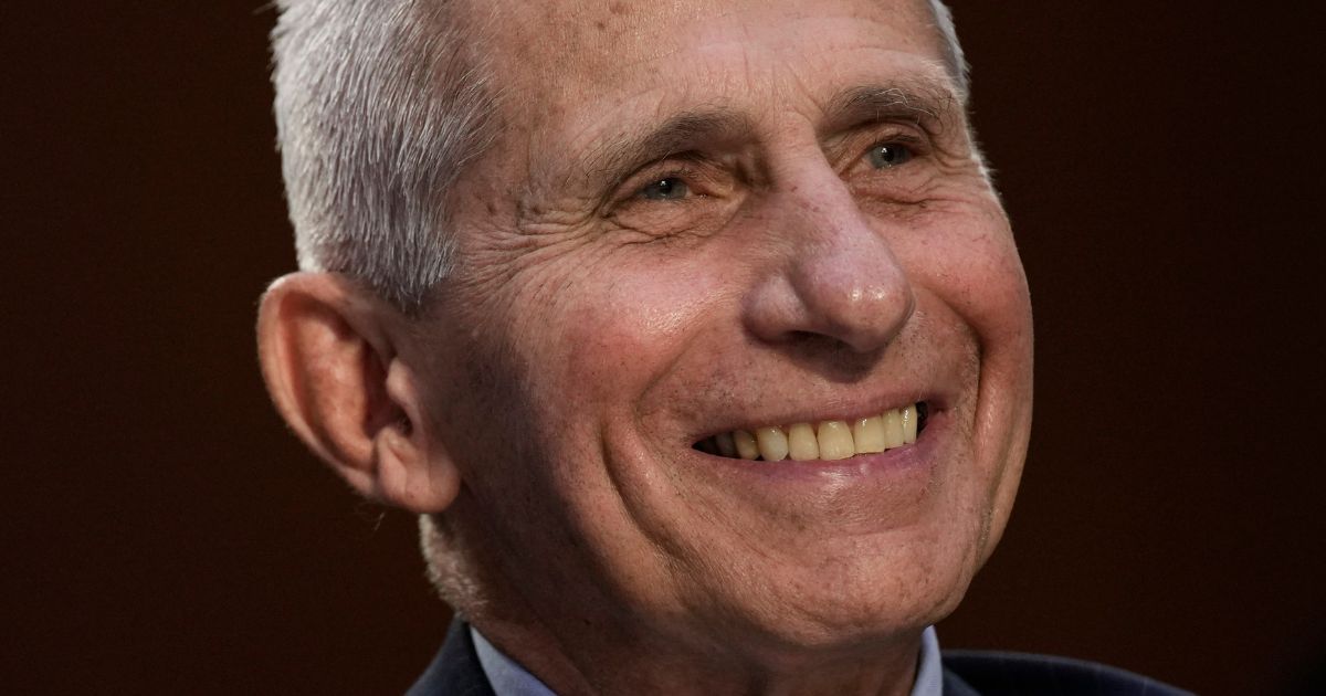 Dr. Anthony Fauci, then-director of the National Institute of Allergy and Infectious Diseases, smiles during a Senate Committee hearing on Capitol Hill in Washington on Sept. 14, 2022.