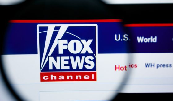 The Fox News logo is displayed on a computer screen in the above stock image.