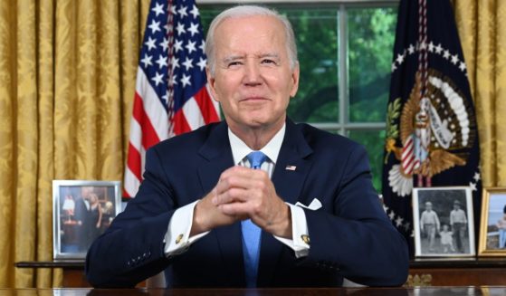 President Joe Biden speaks in the Oval Office of the White House in Washington on Friday.