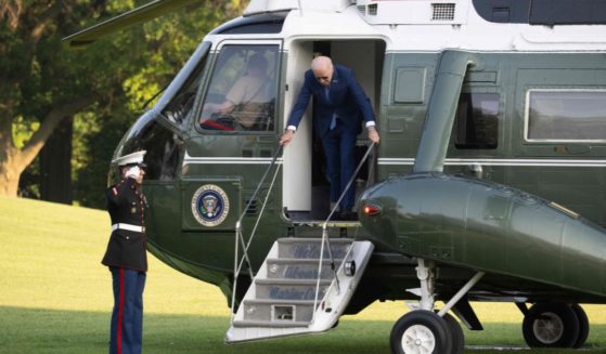 President Joe Biden bumped his head as he disembarked Marine One on the South Lawn of the White House in Washington on Thursday.
